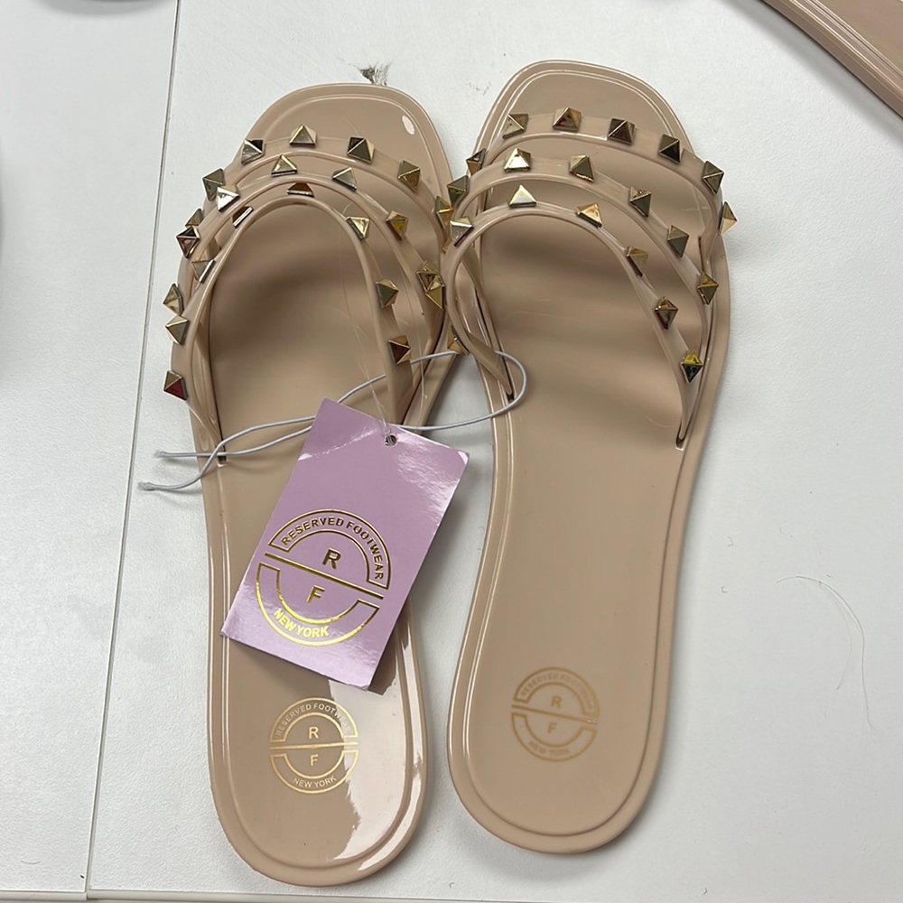 Brand new never used beige and gold sandals slip on various sizes